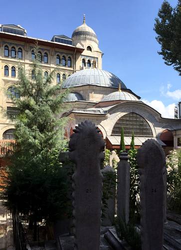 Hotel with Mausoleum and graves